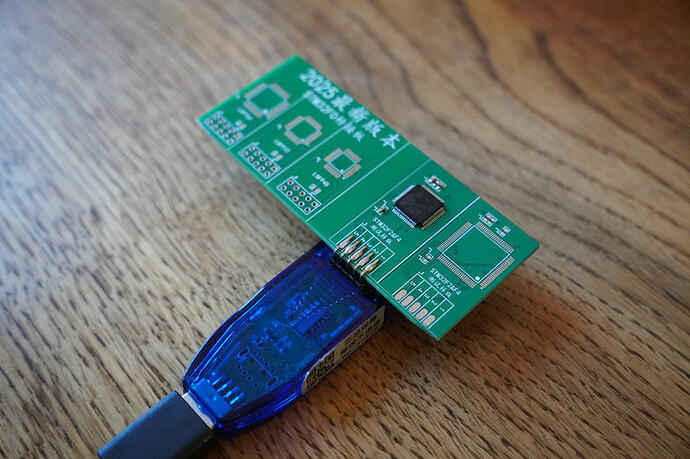 STM32F205RBT6 soldered onto the adapter board and plugged into the dongle